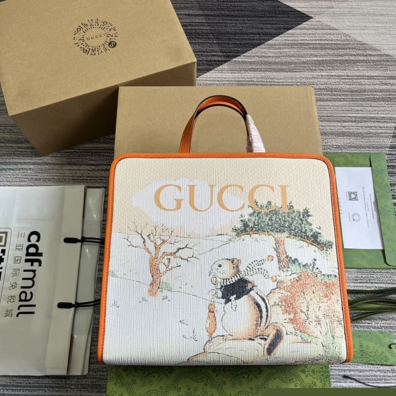 G*u*i shopping bags